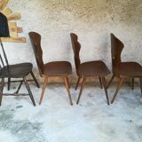 Eight mismatched bistro chairs