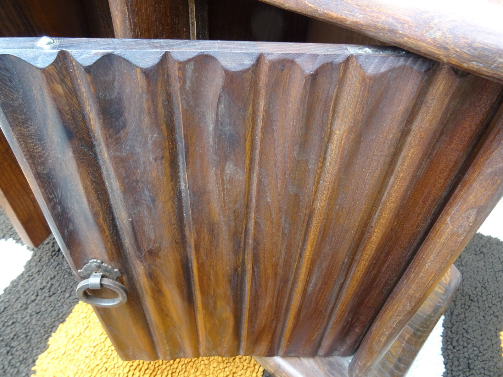 Asymmetrical brutalist furniture in solid elm