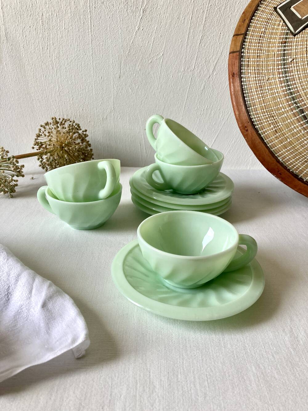 Pressed glass cups and saucers, 1950s