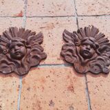 2 cast iron decorations