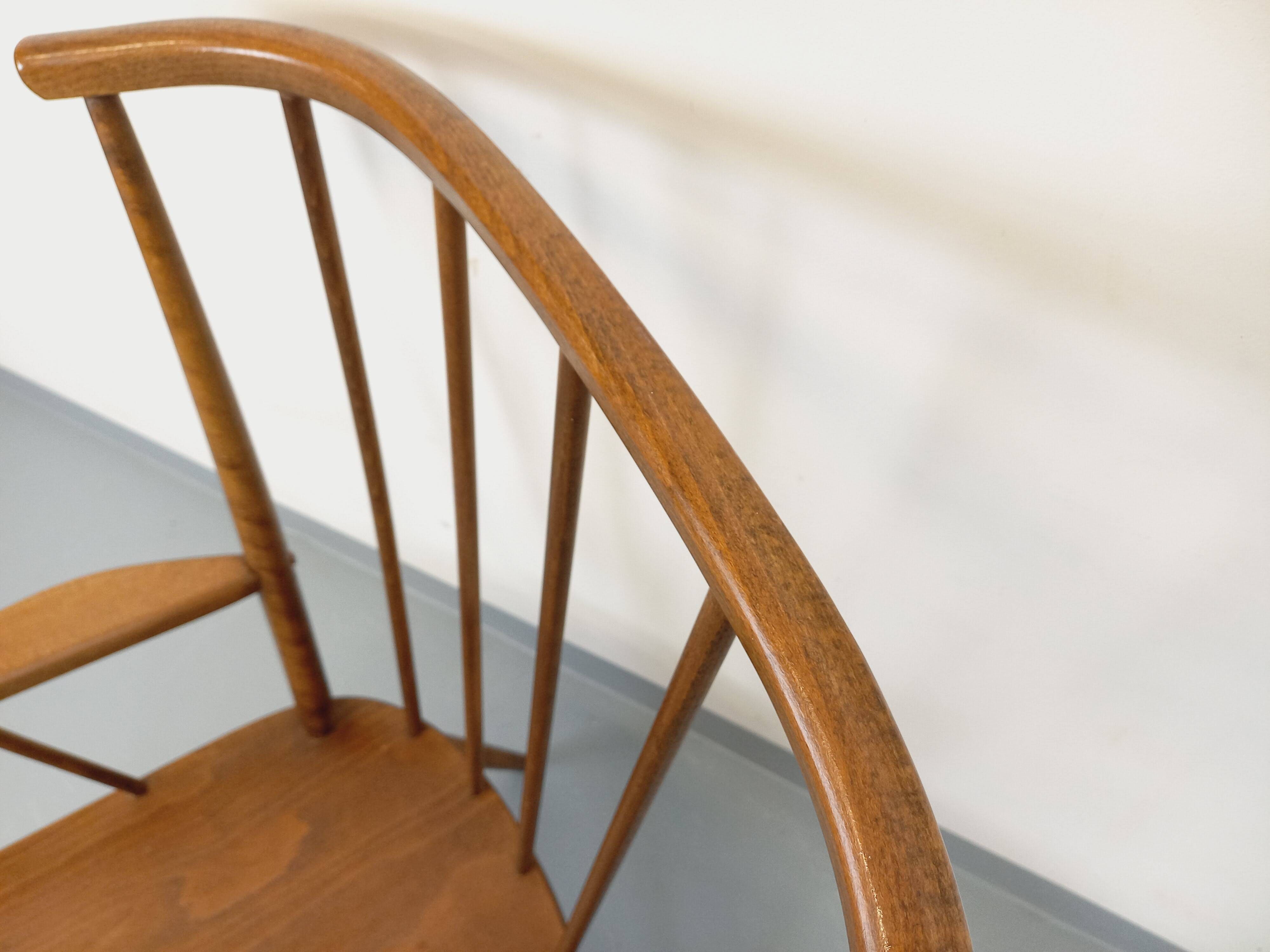 Vintage wooden armchair Baumann model Éventail from the 1960s.