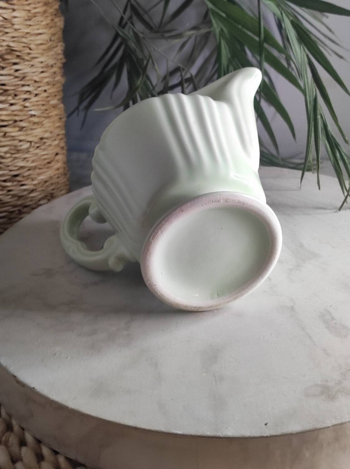 Green ceramic milk jug
