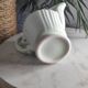 Green ceramic milk jug