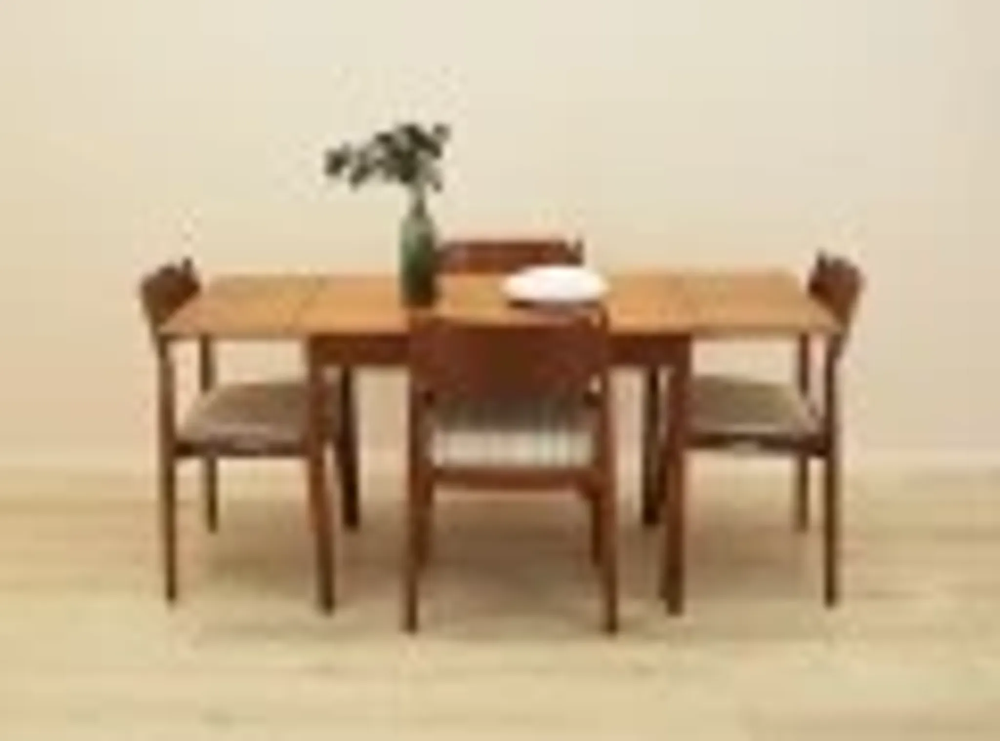 Danish teak extending dining table on solid wood legs, 1970s