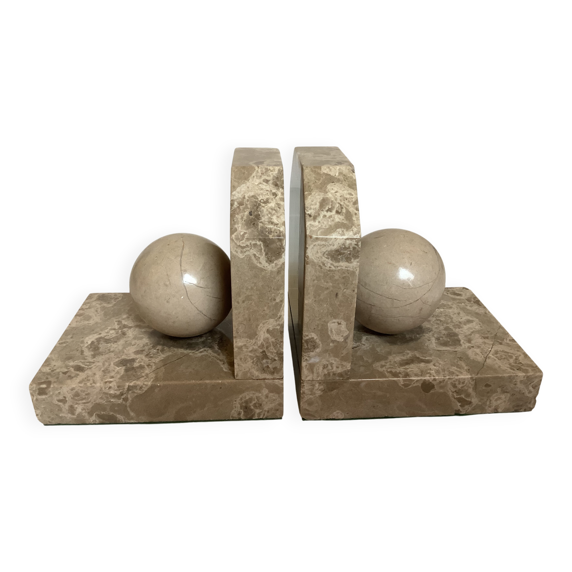 Pair of beige marble bookends.