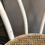 Couple of white bistro chairs