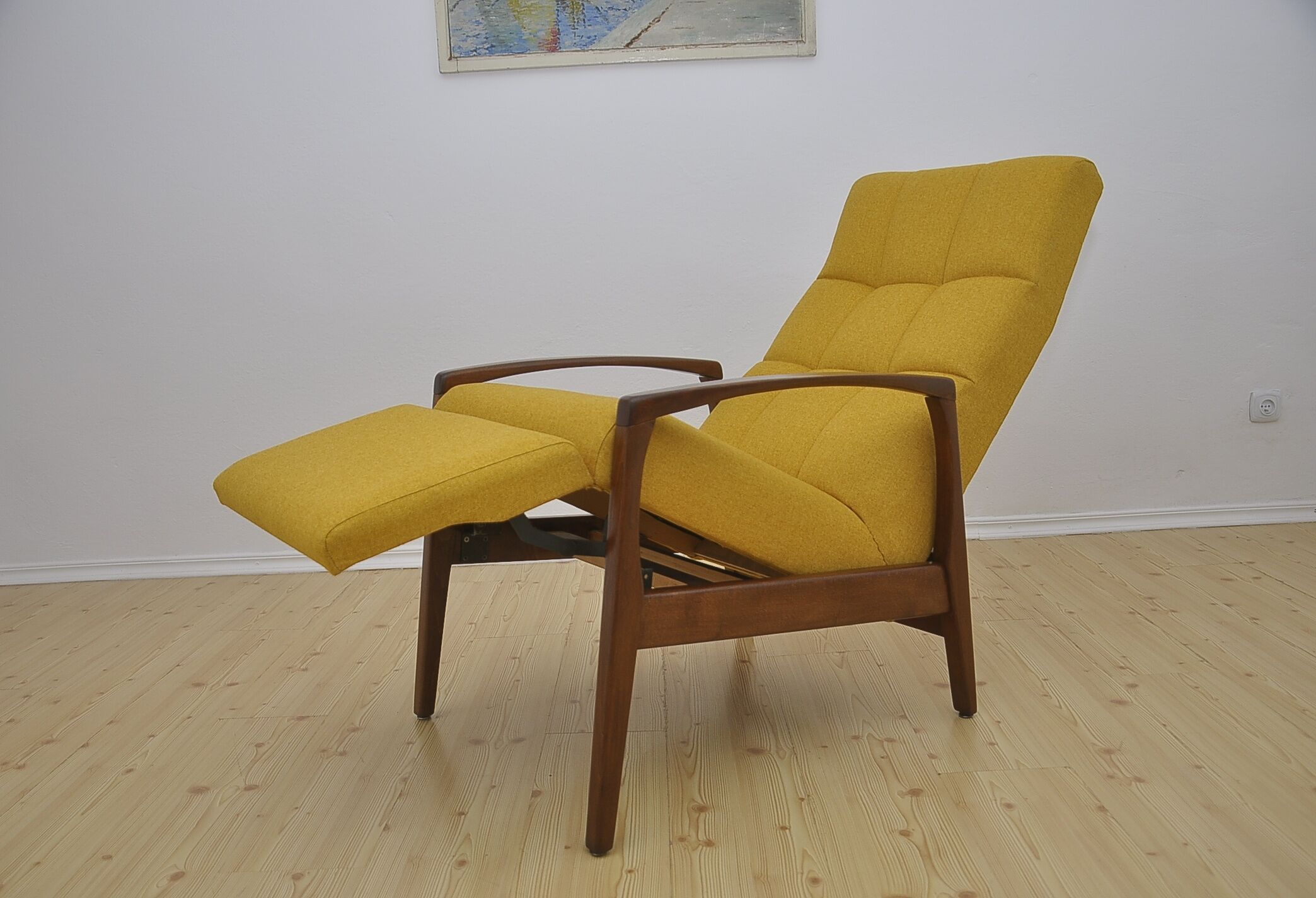 Mid-century armchair with folding footrest, 1960s