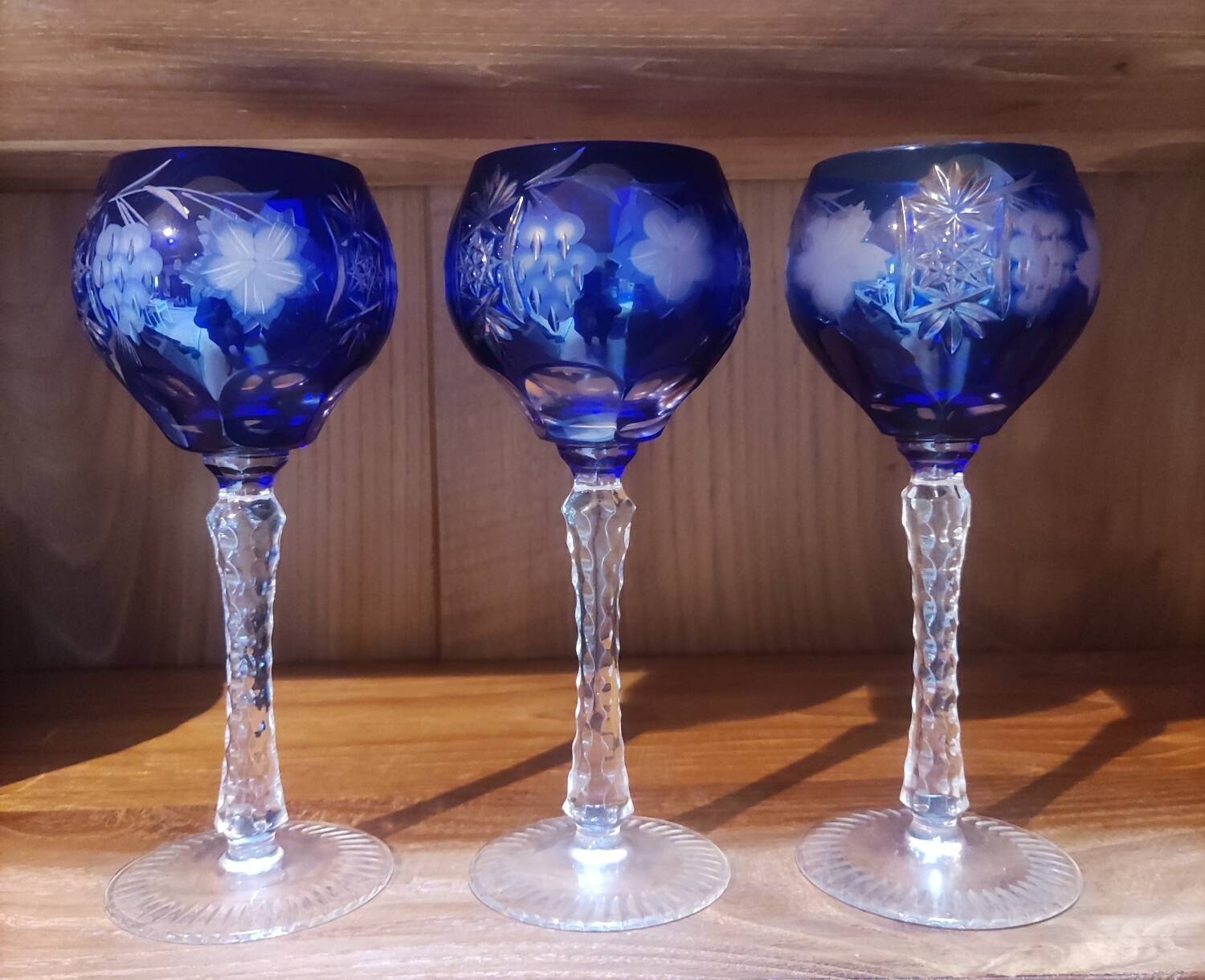 3 large cobalt blue cut crystal stemmed glasses