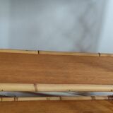 Blond rattan shelf