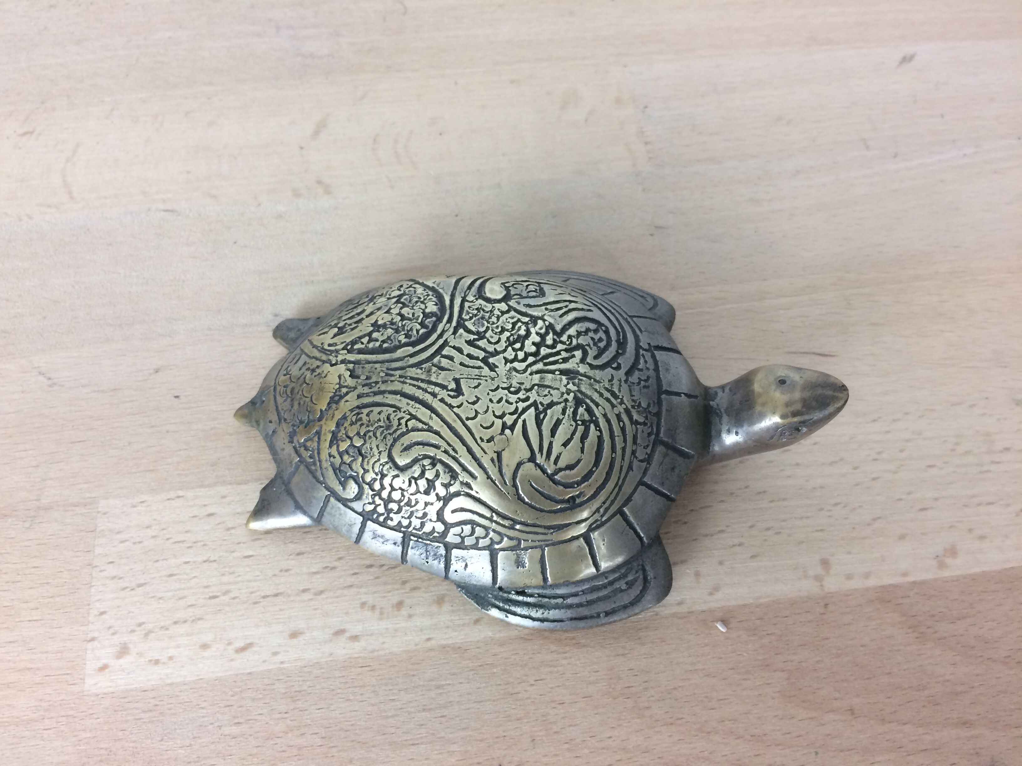 Turtle brass paper press