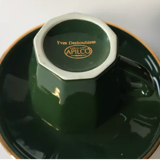 Pair of green apilco coffee cups