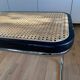 Banc en cannage, bois noir et métal chromé modèle Panchira