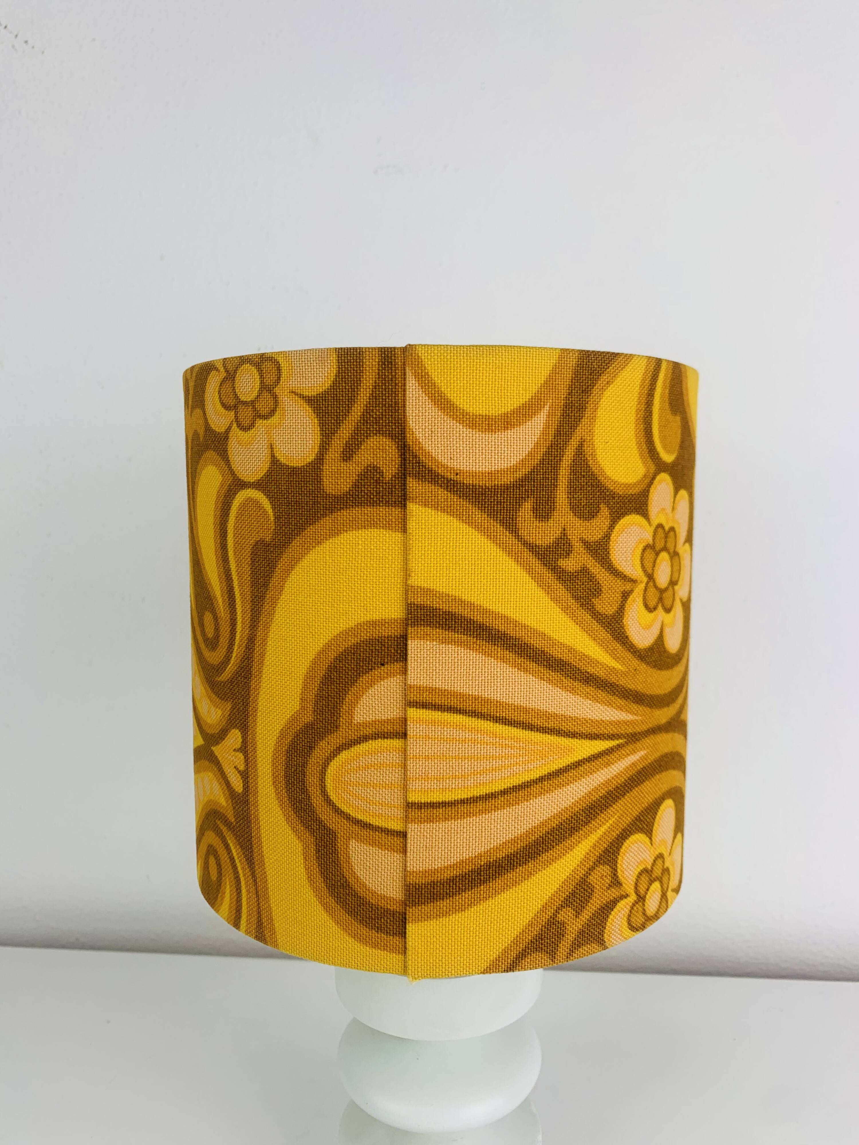 Temde lamp with turned wood and a seventies lampshade.