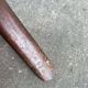 Vintage coat rack on floor in curved wood, thonet style