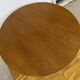 Round table with central base from the 1960s by Baumann.