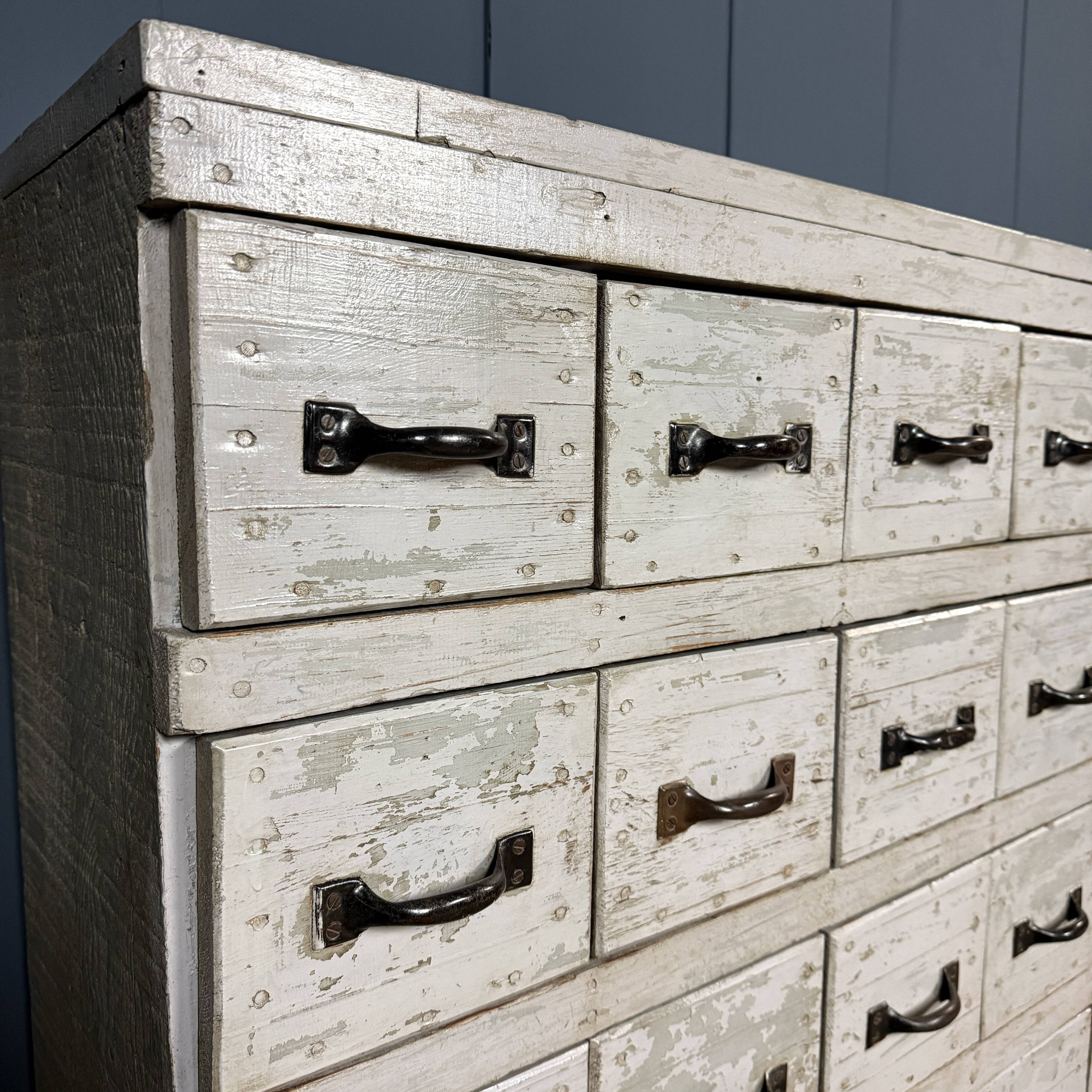 Old light grey workshop drawer cabinet with 25 drawers