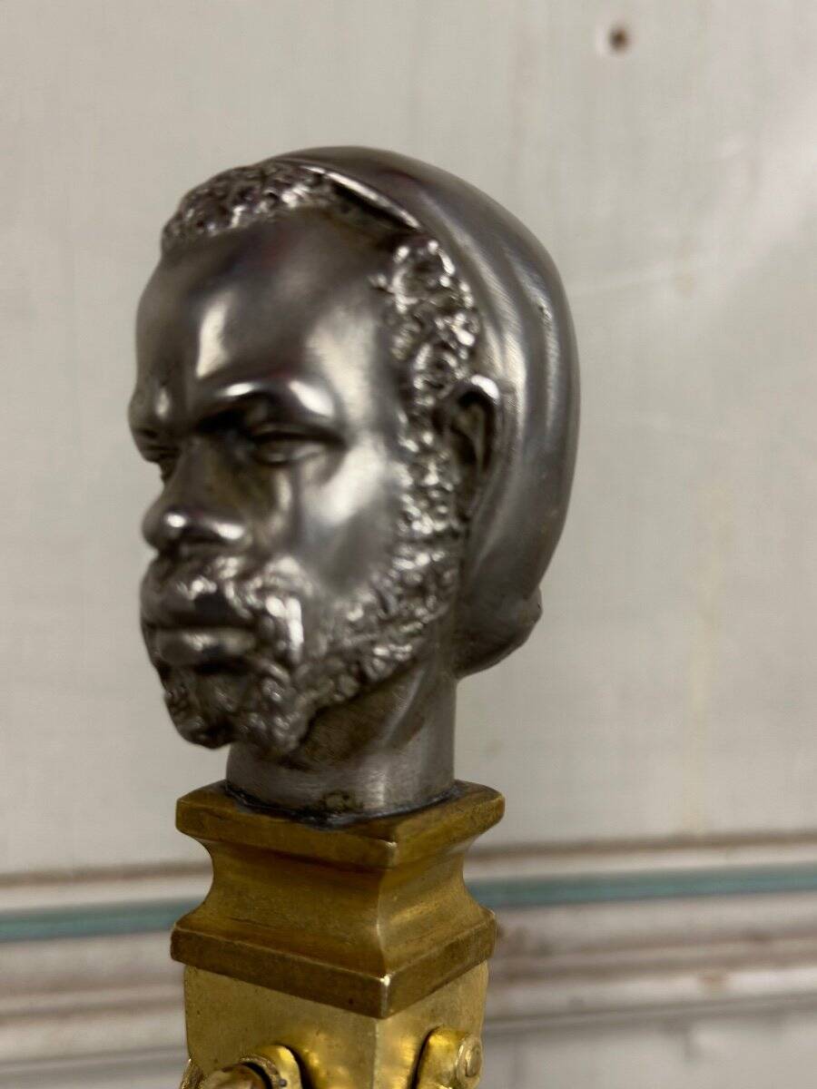 Pair of Abyssinian busts in nickel on gilded bronze and marble bases, 19th century.
