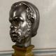 Pair of Abyssinian busts in nickel on gilded bronze and marble bases, 19th century.