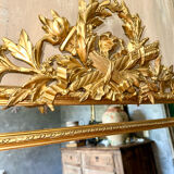 Antique gilded mirror with parcloses from the 19th century.