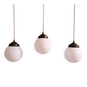 Art Deco trio of suspensions in white opaline, 1930s