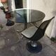 Chromed metal and smoked glass table