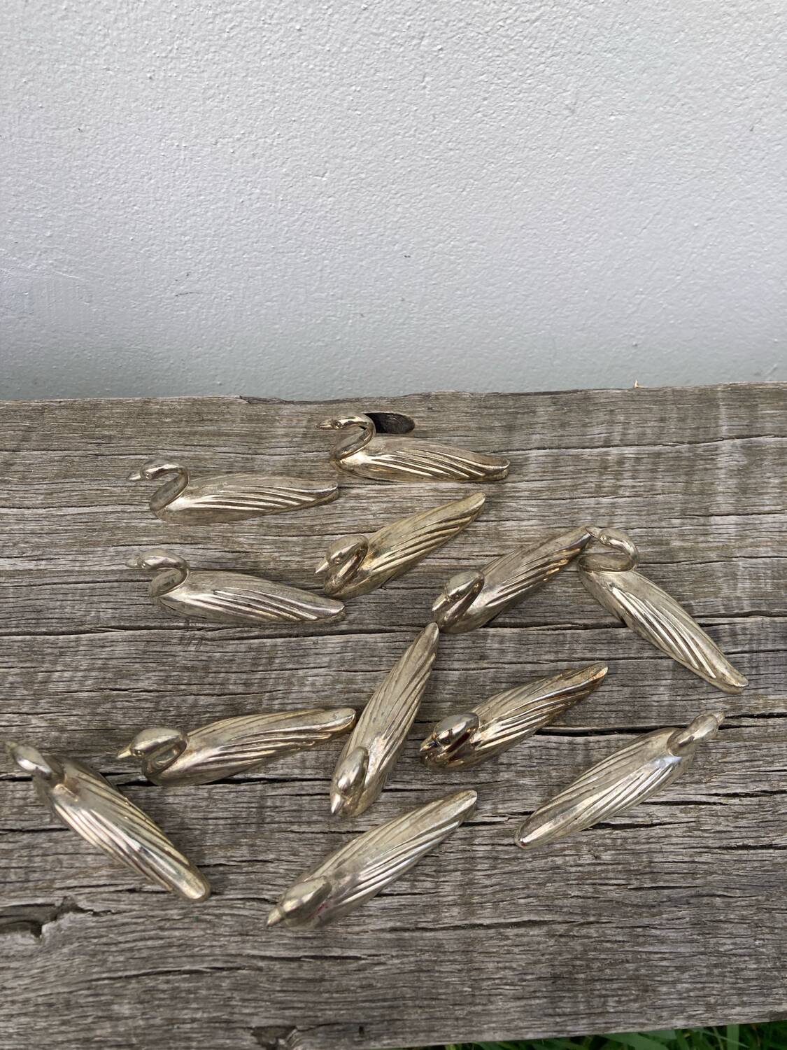 12 duck knife holders in silver metal