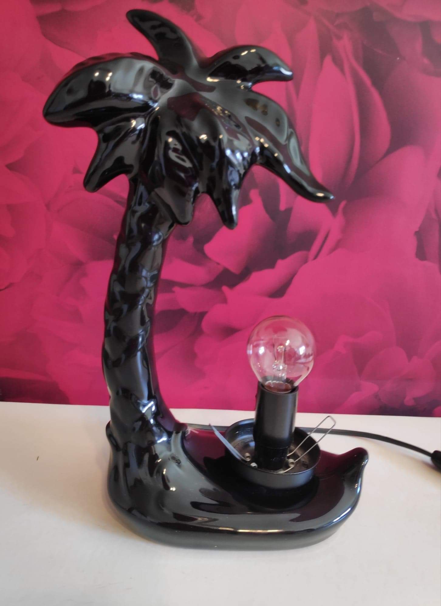 Black ceramic palm lamp and white opaline globe