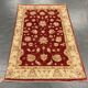 Tapis oriental en laine rouge motif floral,  fait main