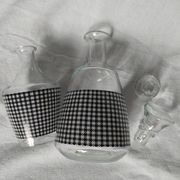 Set of 2 black and white houndstooth glass carafes from the Arques crystal factory. Rare.