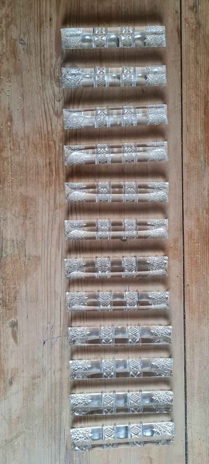 Set of 12 chiseled crystal knife holders