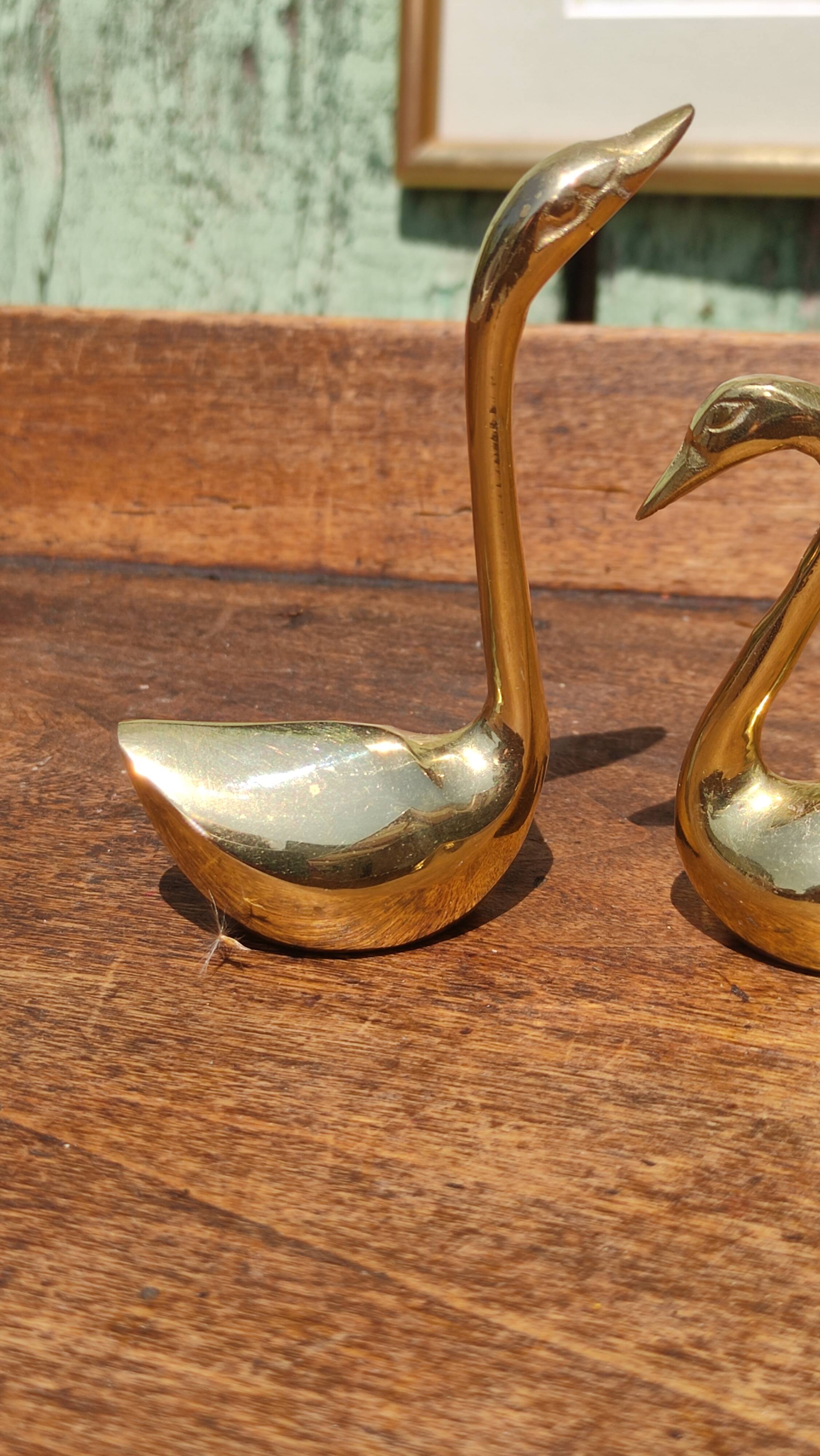 Pair of golden brass swans
