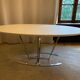 Oval tables white leather and stainless steel matrix with central stitching