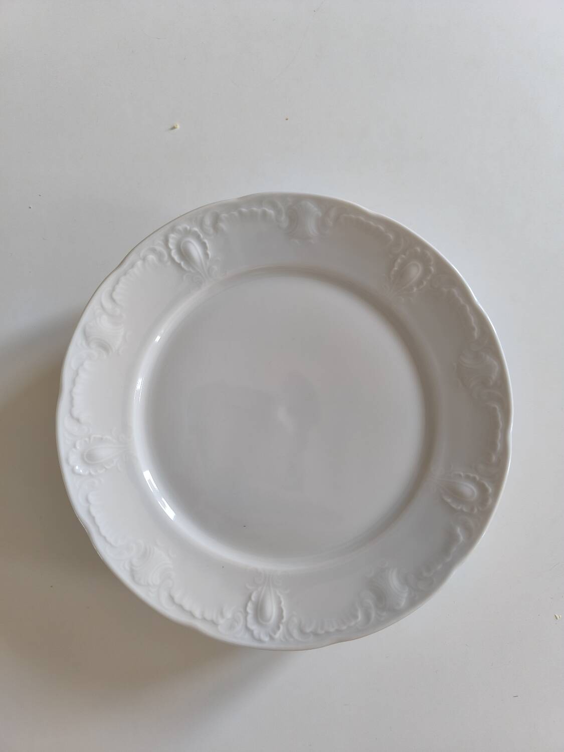 Set of five porcelain dessert plates