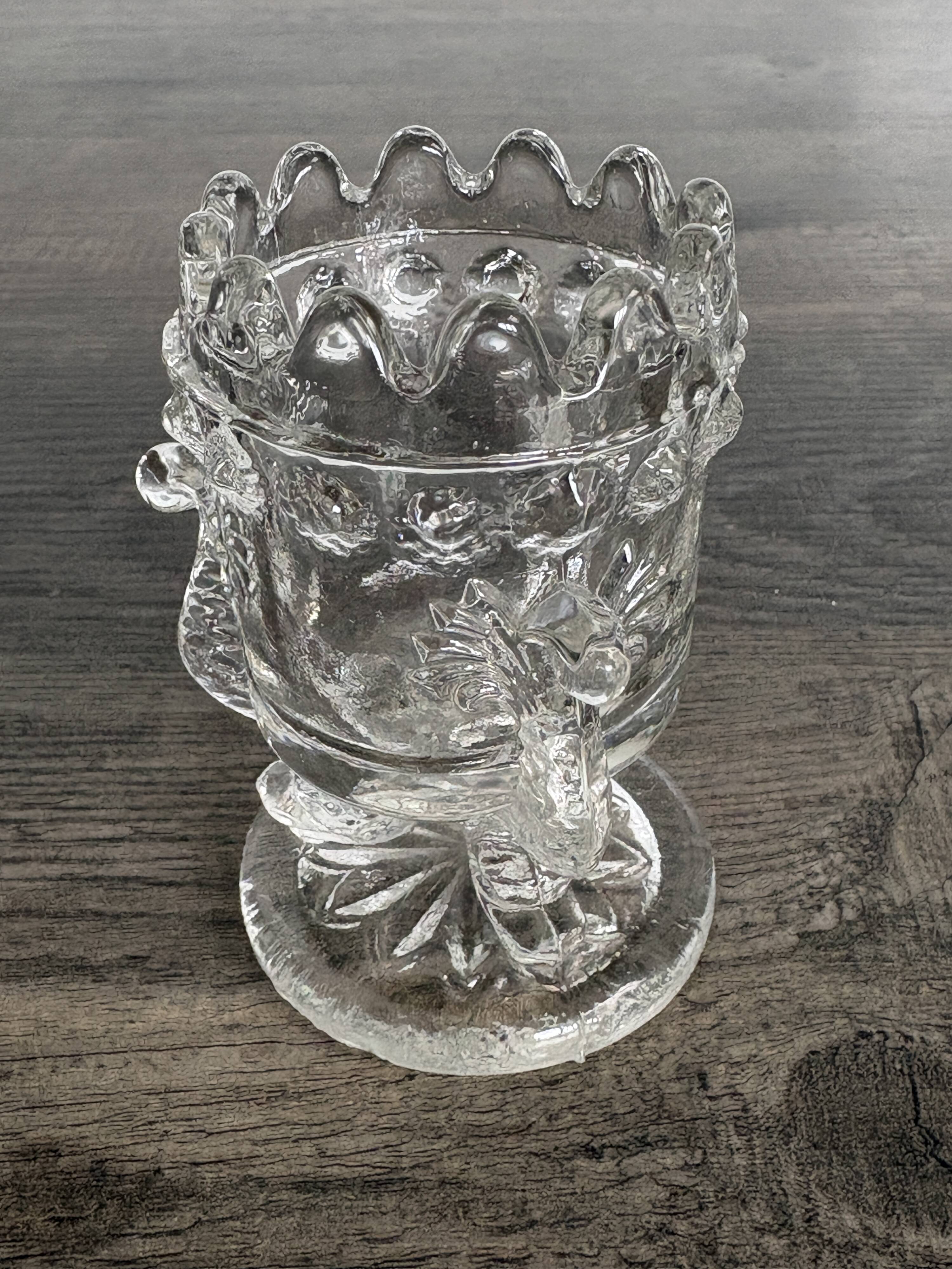 Pair of antique moulded glass egg cups