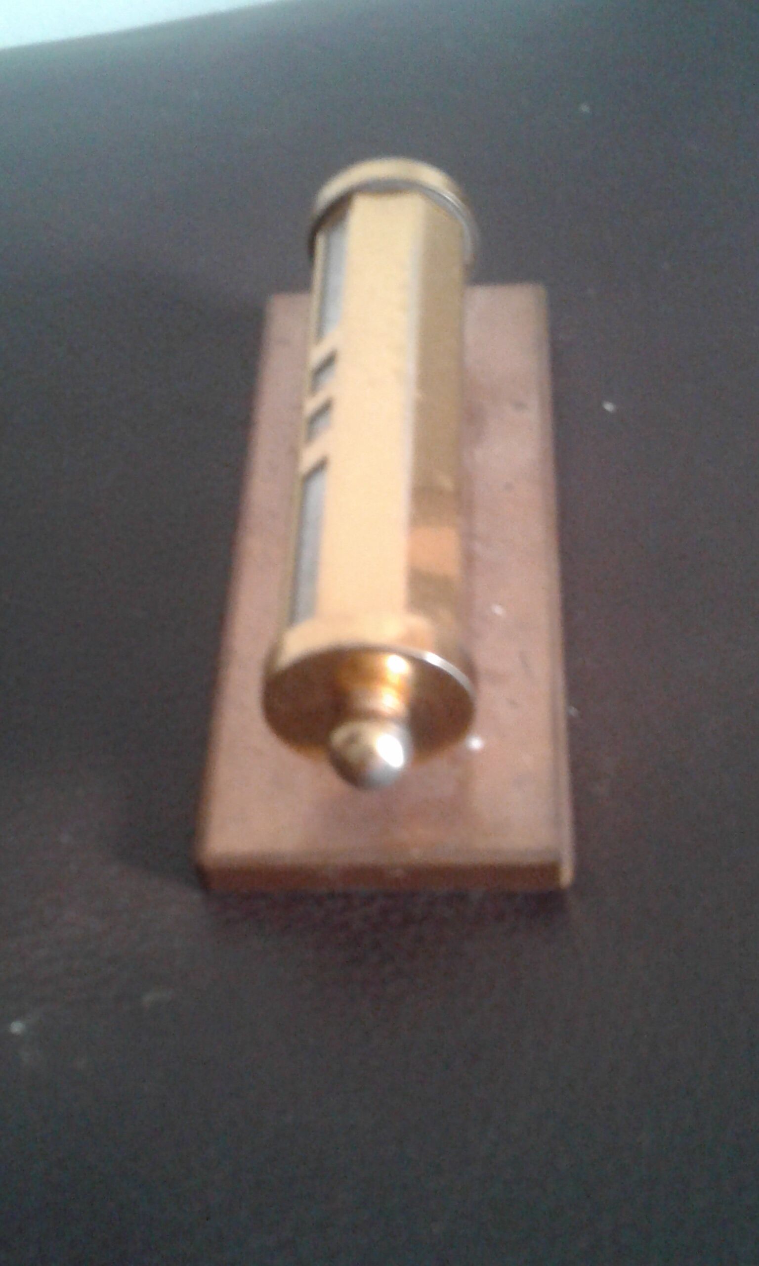 Ancient brass turnstile calendar