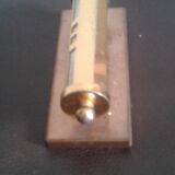 Ancient brass turnstile calendar