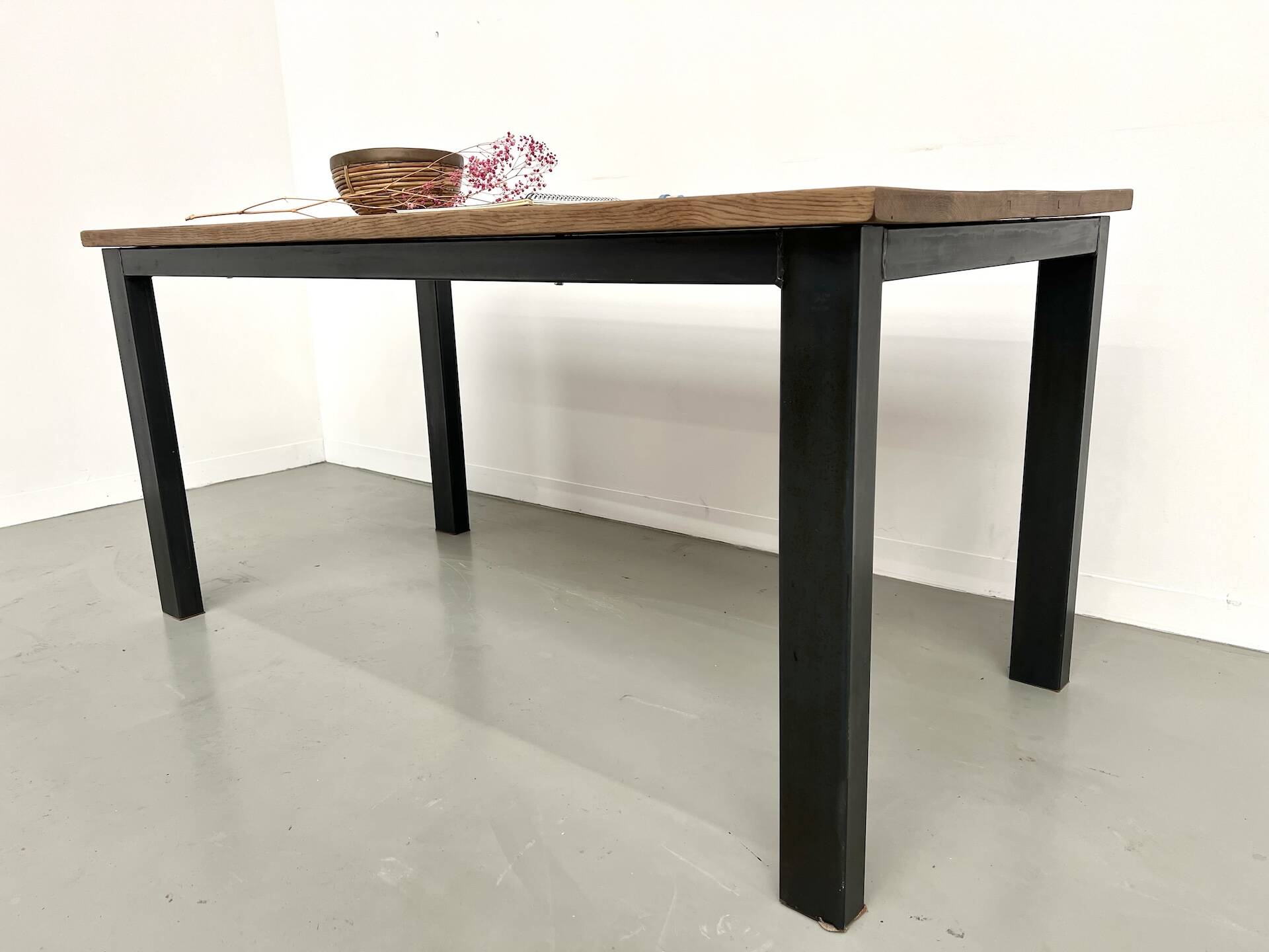 Solid oak dining table from the 70s with metal legs