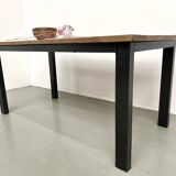 Solid oak dining table from the 70s with metal legs