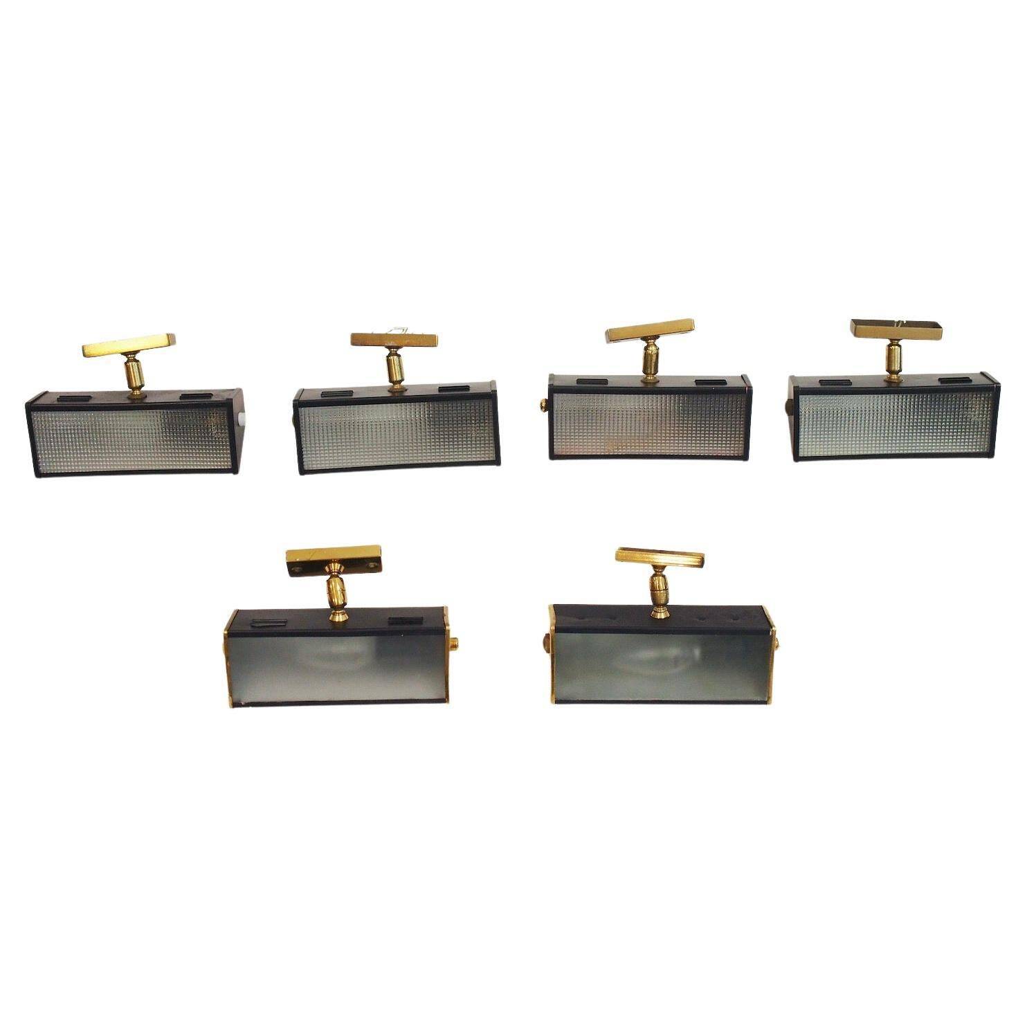 Six Italian wall sconces in brass and metal from the mid-20th century.