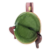 Small plate in glazed green earthenware