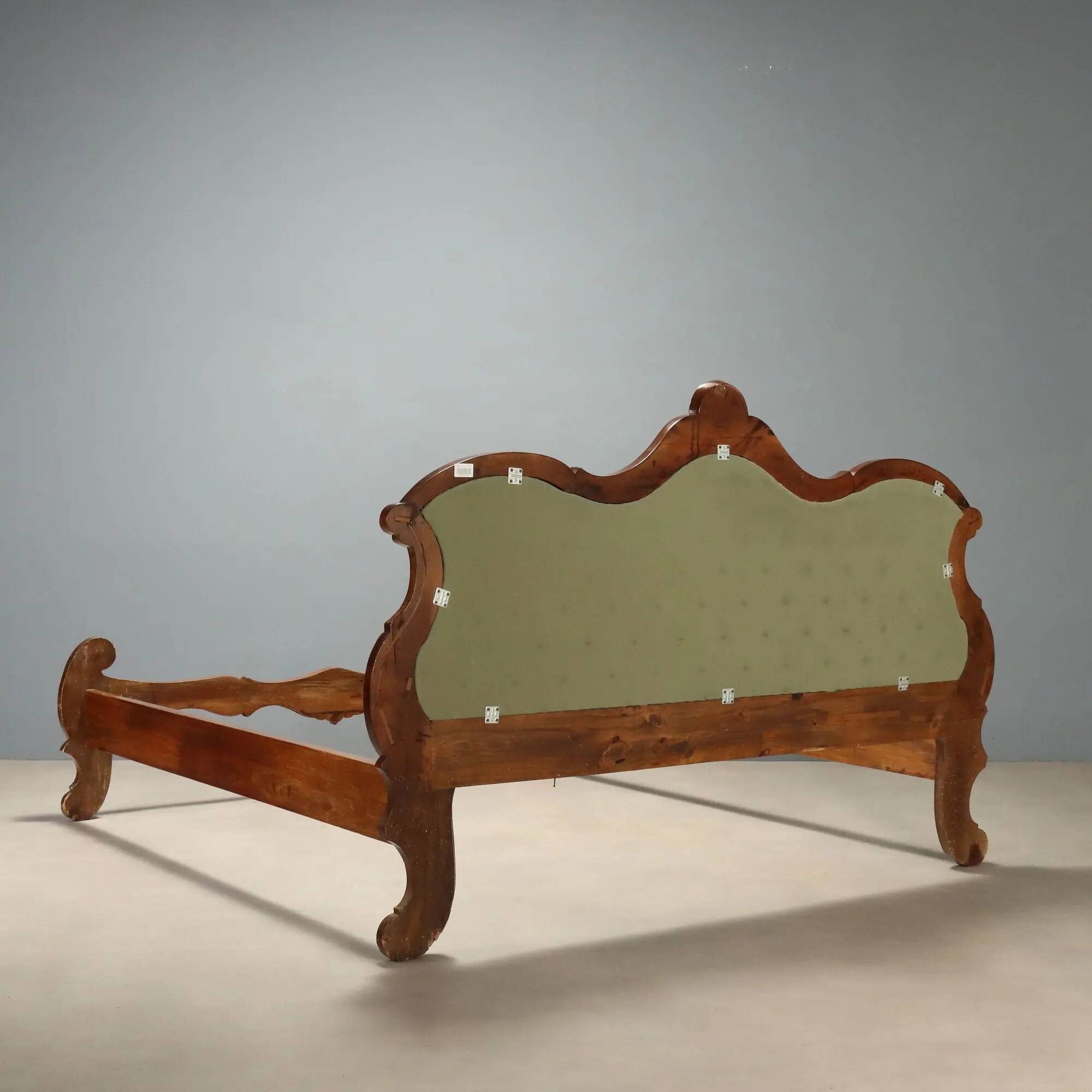 Antique Louis-Philippe bed in carved walnut, Italy, 19th century.