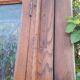 Oak entrance door and its frame and transom, wrought iron gates