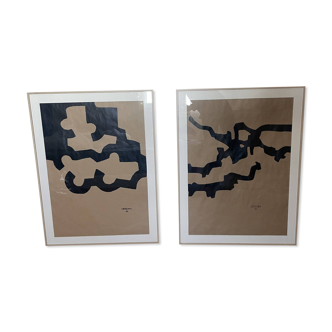 Two Chillida posters under frame