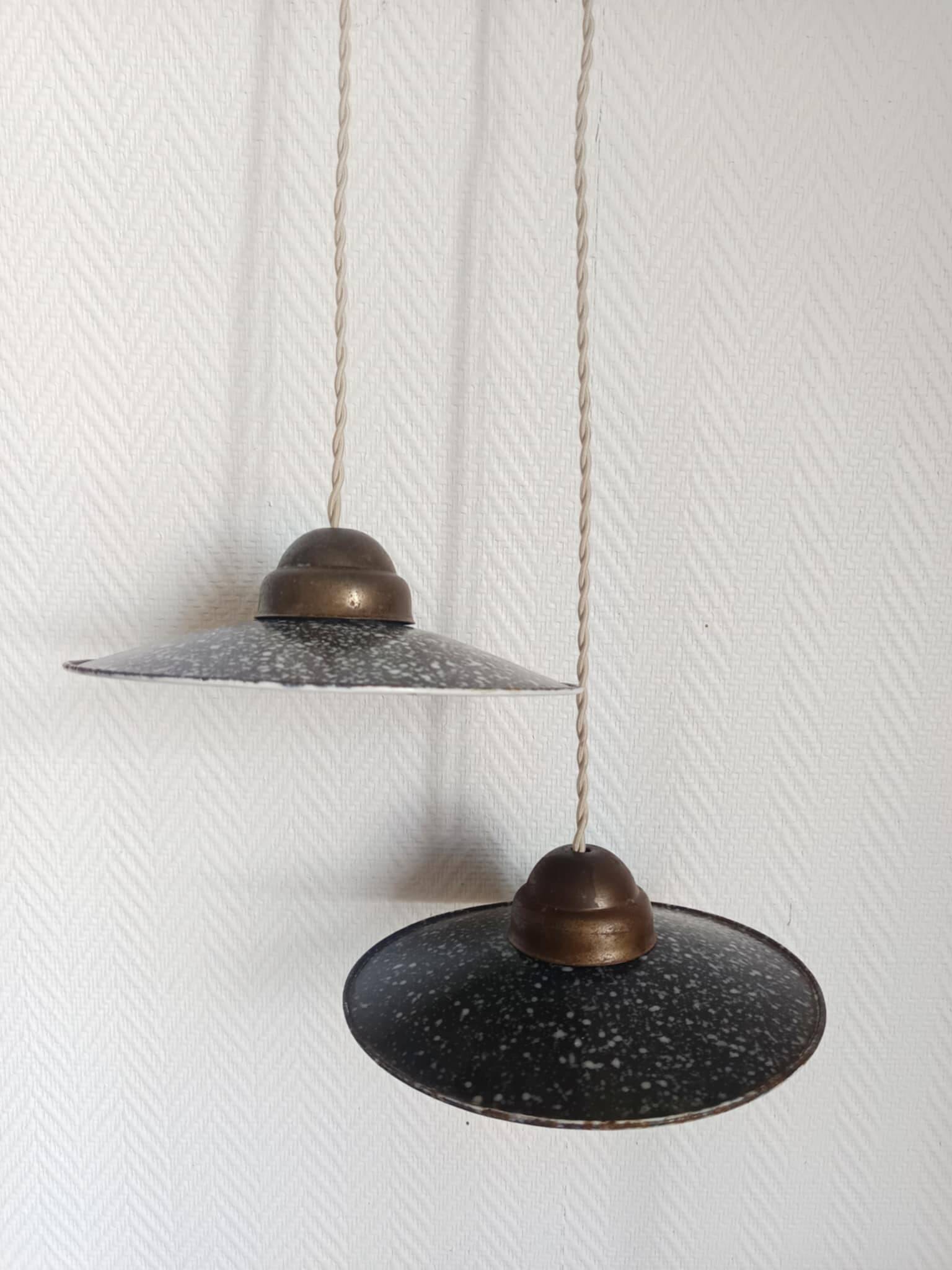 Pair of vintage enamelled sheet metal industrial pendant lights