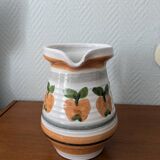 Ceramic pitcher with apple motif