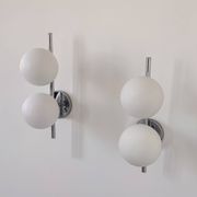 Pair of vintage wall lights in chrome metal and opaline, France 1970.