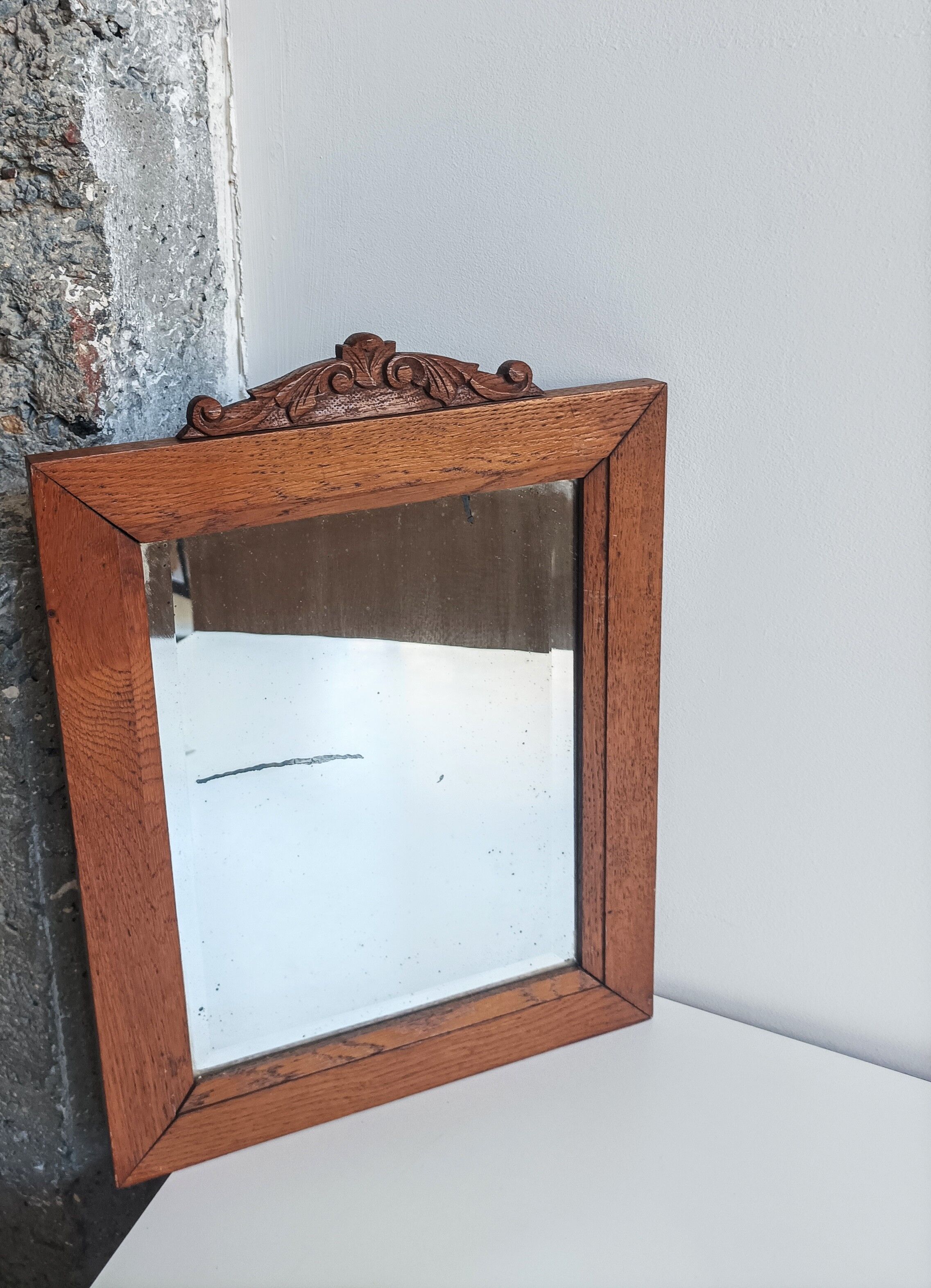 Antique bevelled mirror & carved wooden frame