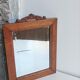 Antique bevelled mirror & carved wooden frame