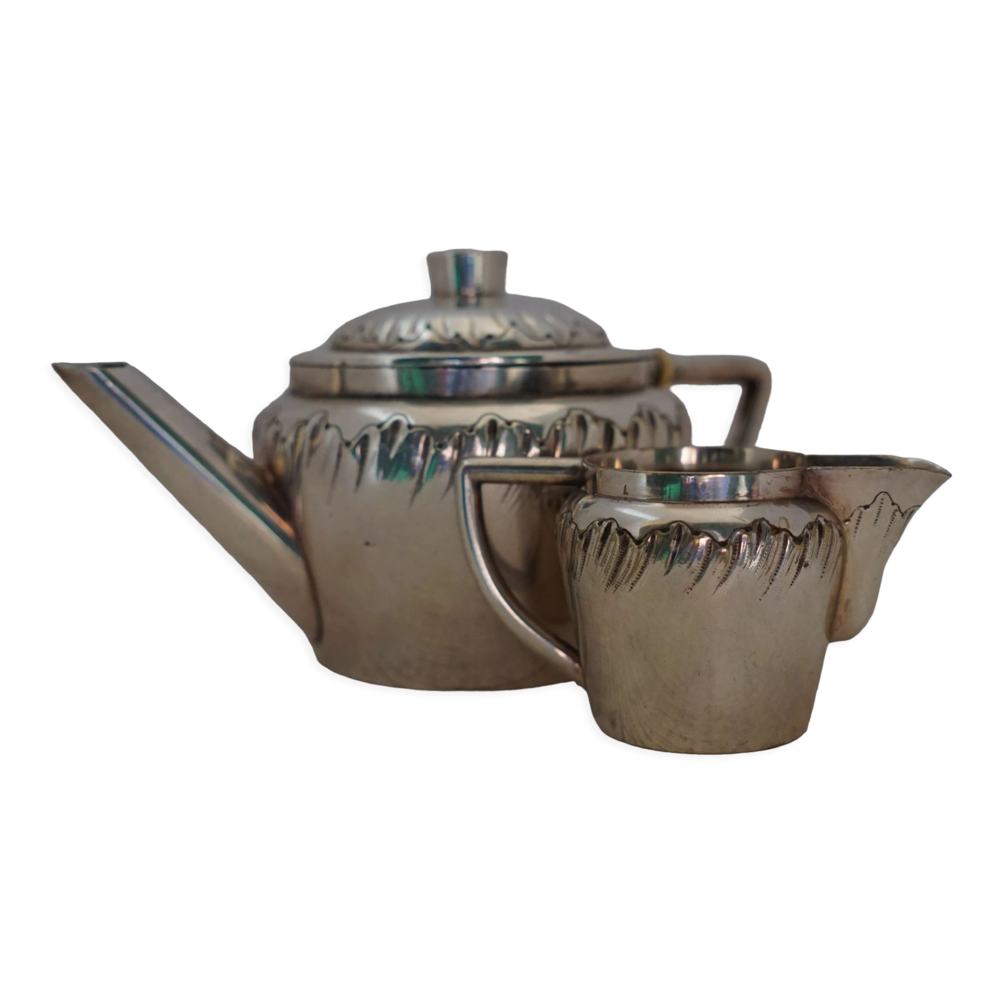Teapot and milk jug English silverware