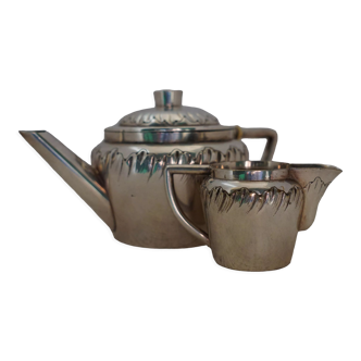 Teapot and milk jug English silverware